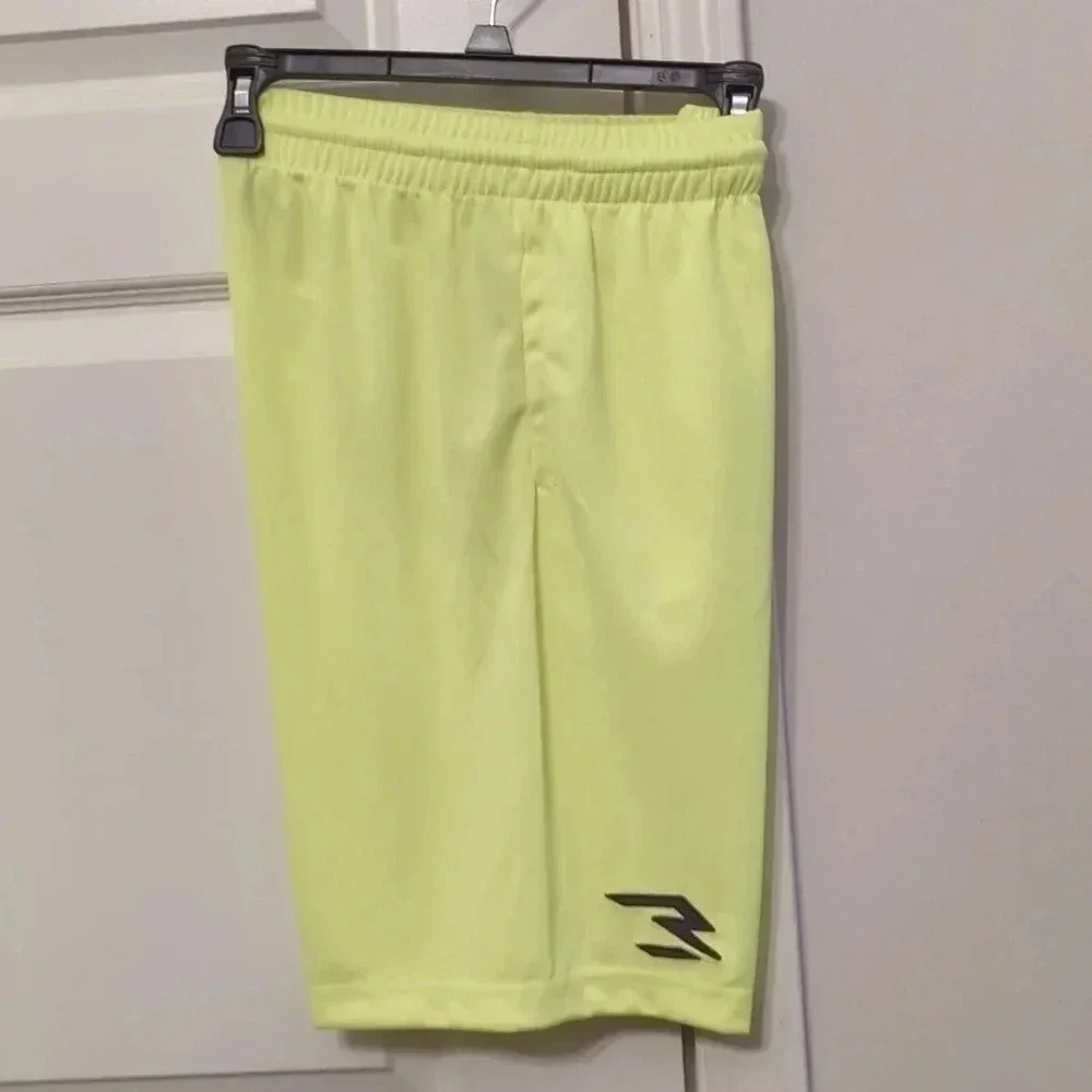 BOYS neon green Nike shorts